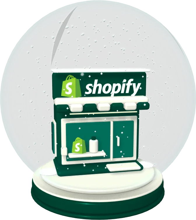 A miniature shop with the official raised Shopify logo, enclosed in a glass snow globe with falling snow.